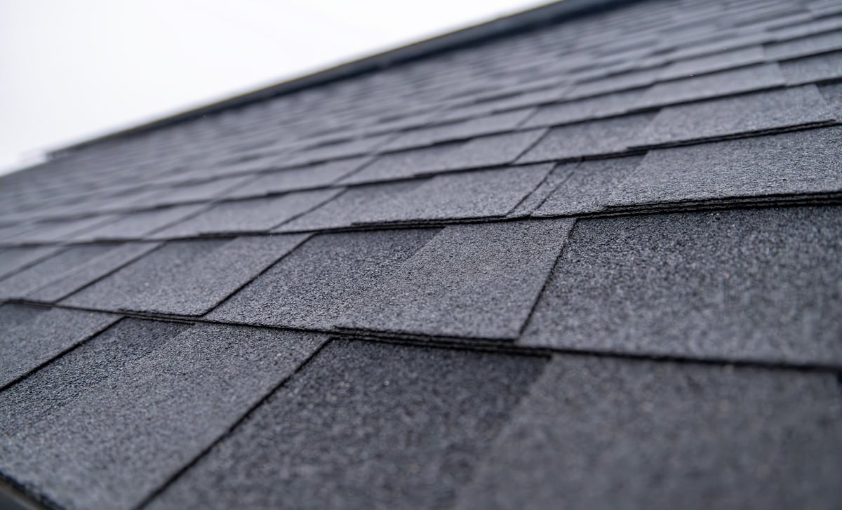 Close-up of dark gray asphalt shingle roofing